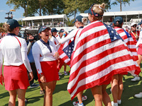 GAINESVILLE, VIRGINIA - SEPTEMBER 15: Lilia Vu of Team USA celebrates with teammates after a Team USA win the Solheim Cup at Robert Trent Jo...