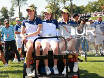 GAINESVILLE, VIRGINIA - SEPTEMBER 15: From left to right, Esther Henseleit, Leona Maguire and Celine Boutier of Team Europe leave on a golf...