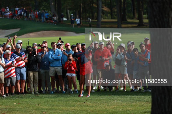 GAINESVILLE, VIRGINIA - SEPTEMBER 15: Nelly Korda of the United States hits out of the rough toward the first green during single matches on...