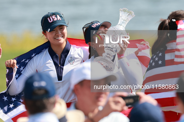 GAINESVILLE, VIRGINIA - SEPTEMBER 15: Lilia Vu of of Team USA kisses the trophy after a Team USA win the Solheim Cup at Robert Trent Jones G...