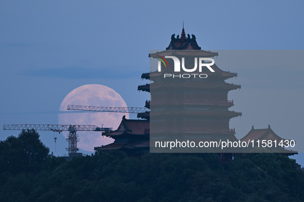 A photo taken in Nanjing, China, on September 17, 2024, shows the ''supermoon'' over Nanjing, Jiangsu province, China. 