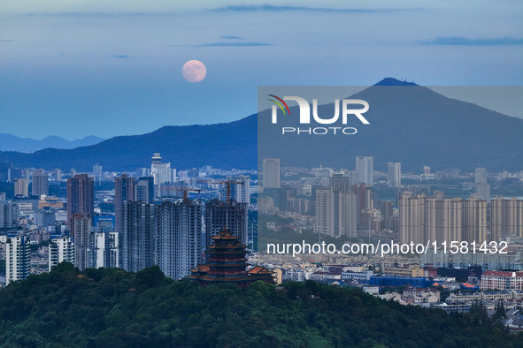 A photo taken in Nanjing, China, on September 17, 2024, shows the ''supermoon'' over Nanjing, Jiangsu province, China. 