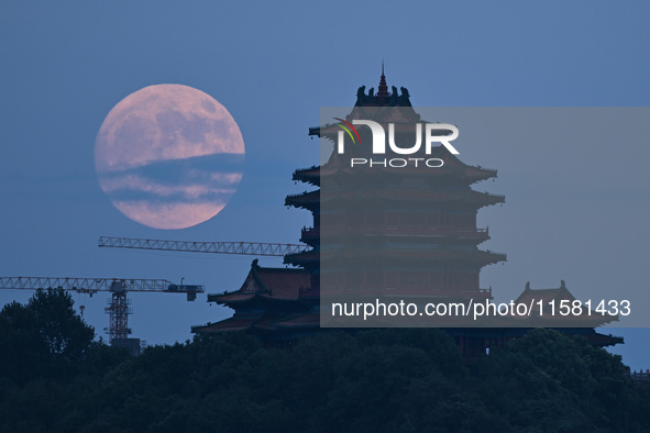 A photo taken in Nanjing, China, on September 17, 2024, shows the ''supermoon'' over Nanjing, Jiangsu province, China. 