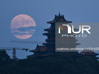 A photo taken in Nanjing, China, on September 17, 2024, shows the ''supermoon'' over Nanjing, Jiangsu province, China. (