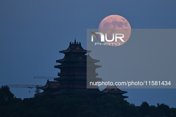 A photo taken in Nanjing, China, on September 17, 2024, shows the ''supermoon'' over Nanjing, Jiangsu province, China. 