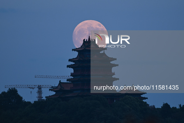 A photo taken in Nanjing, China, on September 17, 2024, shows the ''supermoon'' over Nanjing, Jiangsu province, China. 