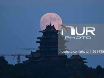 A photo taken in Nanjing, China, on September 17, 2024, shows the ''supermoon'' over Nanjing, Jiangsu province, China. (