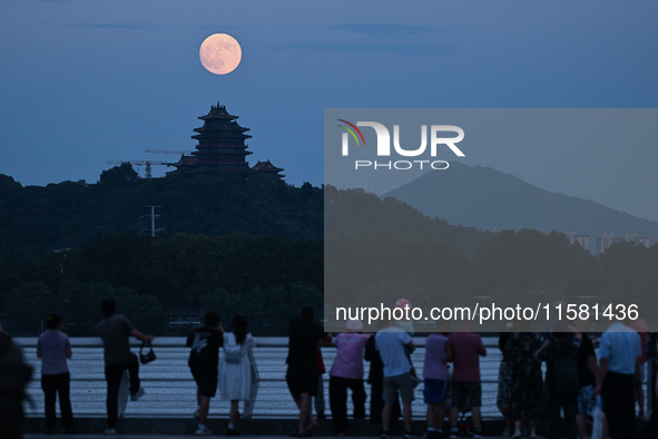 A photo taken in Nanjing, China, on September 17, 2024, shows the ''supermoon'' over Nanjing, Jiangsu province, China. 