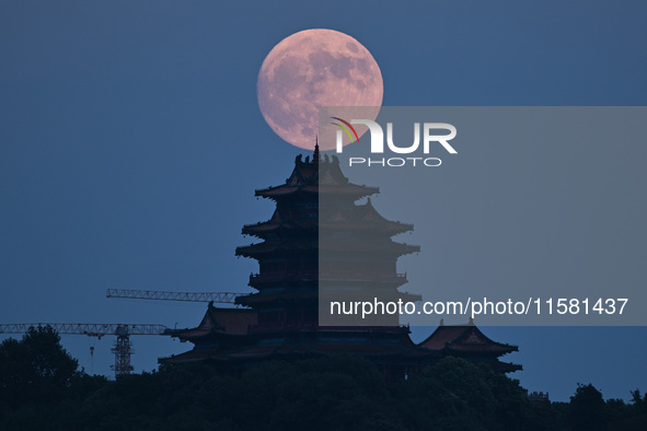 A photo taken in Nanjing, China, on September 17, 2024, shows the ''supermoon'' over Nanjing, Jiangsu province, China. 