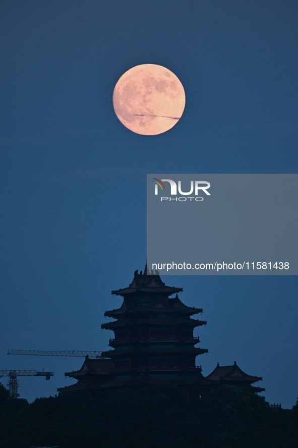 A photo taken in Nanjing, China, on September 17, 2024, shows the ''supermoon'' over Nanjing, Jiangsu province, China. 