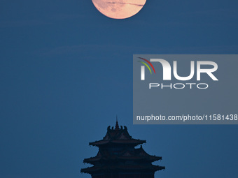 A photo taken in Nanjing, China, on September 17, 2024, shows the ''supermoon'' over Nanjing, Jiangsu province, China. (