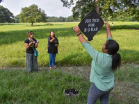 People fly kites with protest slogans written on them during a kite festival in Kolkata, India, on September 17, 2024. The rape and murder c...