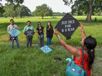 People fly kites with protest slogans written on them during a kite festival in Kolkata, India, on September 17, 2024. The rape and murder c...