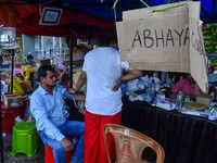 A doctor consults at a free clinic named ''Abhaya Clinic'' at the doctors' agitation site in front of the Health Ministry head office in Kol...