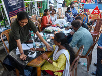 A doctor consults at a free clinic named ''Abhaya Clinic'' at the doctors' agitation site in front of the Health Ministry head office in Kol...