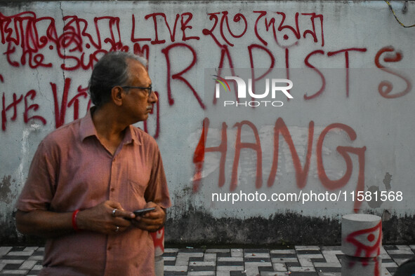 Various protest writings are seen in Kolkata, India, on September 17, 2024. 