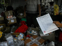 A patient collects free medicine from a free clinic named ''Abhaya Clinic'' at the doctors' agitation site in front of the Health Ministry h...