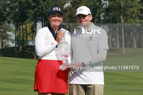 GAINESVILLE, VIRGINIA - SEPTEMBER 15: Allisen Corpuz of the United States poses with her significant other while holding the trophy after a...