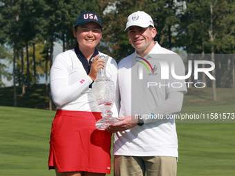 GAINESVILLE, VIRGINIA - SEPTEMBER 15: Allisen Corpuz of the United States poses with her significant other while holding the trophy after a...