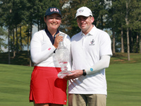 GAINESVILLE, VIRGINIA - SEPTEMBER 15: Allisen Corpuz of the United States poses with her significant other while holding the trophy after a...