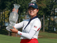 GAINESVILLE, VIRGINIA - SEPTEMBER 15: Rose Zhang of the United States poses with the trophy after a Team USA win at the conclusion of the So...