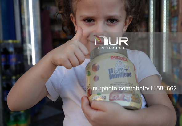 A photo taken in Algiers, Algeria, on September 17, 2024, shows ''El Mordjene'' chocolate and hazelnut spread boxes for sale in a supermarke...