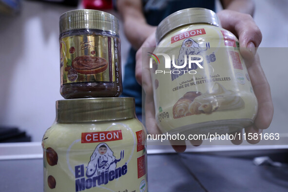 A photo taken in Algiers, Algeria, on September 17, 2024, shows ''El Mordjene'' chocolate and hazelnut spread boxes for sale in a supermarke...