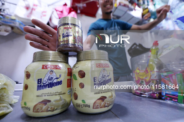 A photo taken in Algiers, Algeria, on September 17, 2024, shows ''El Mordjene'' chocolate and hazelnut spread boxes for sale in a supermarke...