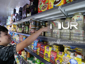 A photo taken in Algiers, Algeria, on September 17, 2024, shows ''El Mordjene'' chocolate and hazelnut spread boxes for sale in a supermarke...