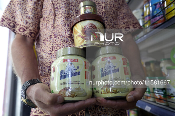 A photo taken in Algiers, Algeria, on September 17, 2024, shows ''El Mordjene'' chocolate and hazelnut spread boxes for sale in a supermarke...