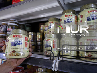 A photo taken in Algiers, Algeria, on September 17, 2024, shows ''El Mordjene'' chocolate and hazelnut spread boxes for sale in a supermarke...