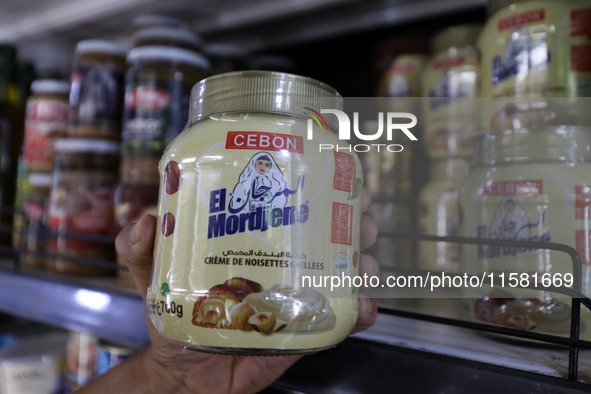 A photo taken in Algiers, Algeria, on September 17, 2024, shows ''El Mordjene'' chocolate and hazelnut spread boxes for sale in a supermarke...