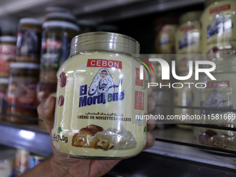 A photo taken in Algiers, Algeria, on September 17, 2024, shows ''El Mordjene'' chocolate and hazelnut spread boxes for sale in a supermarke...