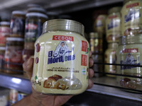 A photo taken in Algiers, Algeria, on September 17, 2024, shows ''El Mordjene'' chocolate and hazelnut spread boxes for sale in a supermarke...