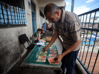 The Palestinian Yasser Abu Harbid, a 50-year-old displaced from northern Gaza to Deir al-Balah, lives in a school run by the United Nations...