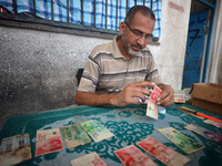 The Palestinian Yasser Abu Harbid, a 50-year-old displaced from northern Gaza to Deir al-Balah, lives in a school run by the United Nations...