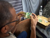 The Palestinian Yasser Abu Harbid, a 50-year-old displaced from northern Gaza to Deir al-Balah, lives in a school run by the United Nations...