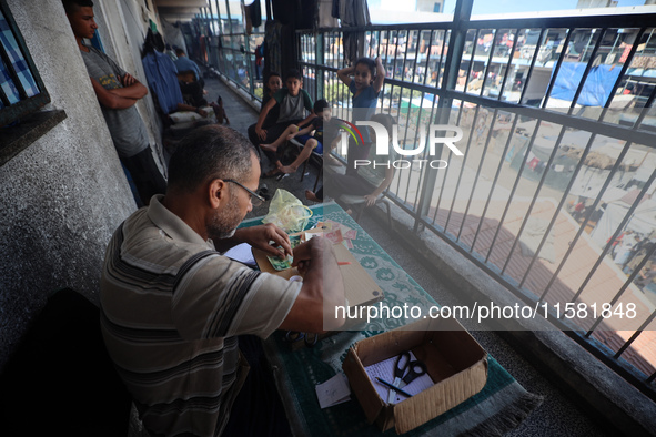 The Palestinian Yasser Abu Harbid, a 50-year-old displaced from northern Gaza to Deir al-Balah, lives in a school run by the United Nations...