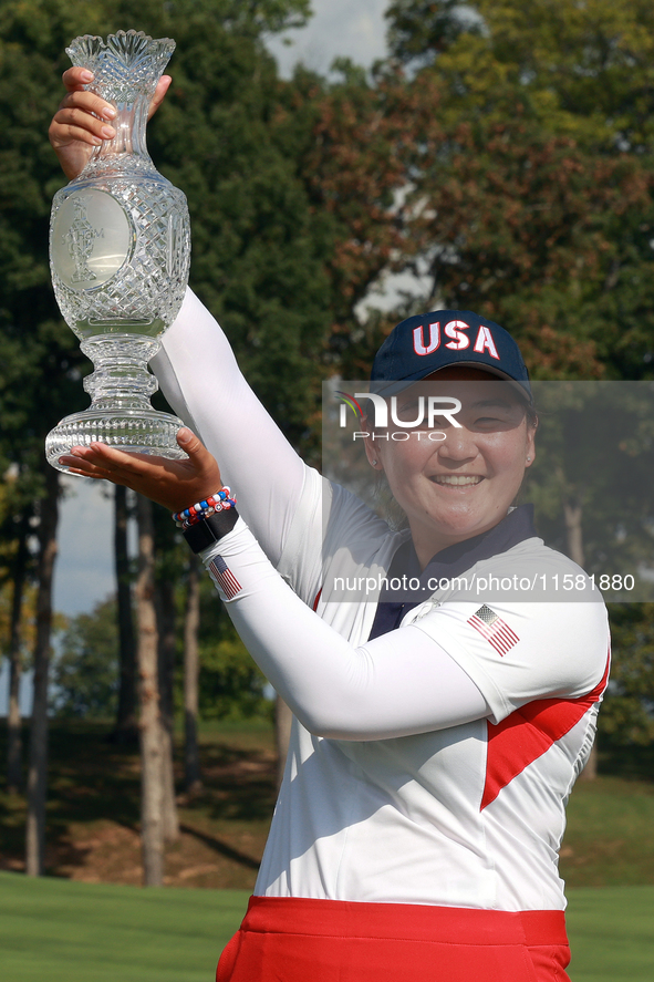 GAINESVILLE, VIRGINIA - SEPTEMBER 15: Allisen Corpuz of the United States poses with the trophy after a Team USA win at the conclusion of th...