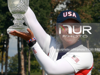 GAINESVILLE, VIRGINIA - SEPTEMBER 15: Allisen Corpuz of the United States poses with the trophy after a Team USA win at the conclusion of th...