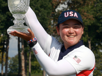 GAINESVILLE, VIRGINIA - SEPTEMBER 15: Allisen Corpuz of the United States poses with the trophy after a Team USA win at the conclusion of th...