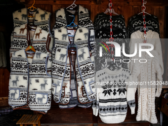 Traditional winter wool cardigans are seen on a landmark Krupowki Street in the center of Zakopane, a popular Tatra mountain holiday resort...