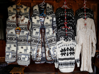 Traditional winter wool cardigans are seen on a landmark Krupowki Street in the center of Zakopane, a popular Tatra mountain holiday resort...