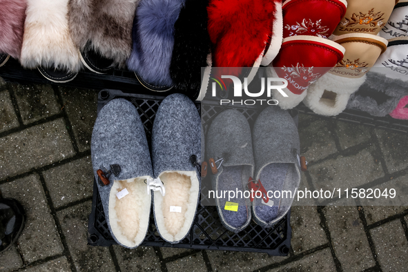 Traditional winter sleepers are seen on a landmark Krupowki Street in the center of Zakopane, a popular Tatra mountain holiday resort as Aut...