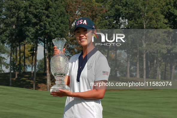 GAINESVILLE, VIRGINIA - SEPTEMBER 15: Andrea Lee of the United States poses with the trophy after a Team USA win at the conclusion of the So...