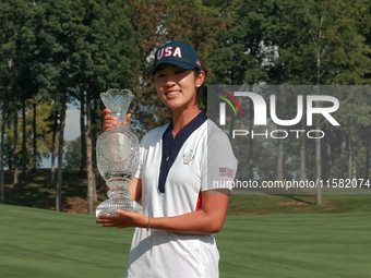 GAINESVILLE, VIRGINIA - SEPTEMBER 15: Andrea Lee of the United States poses with the trophy after a Team USA win at the conclusion of the So...