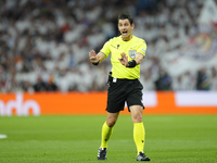 Referee Umut Meler of Turkiye during the UEFA Champions League 2024/25 League Phase MD1 match between Real Madrid C.F. and VfB Stuttgart at...