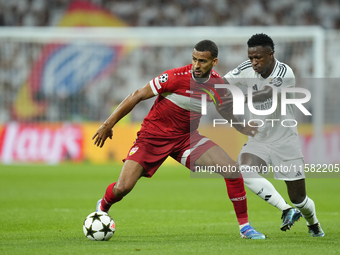 Josha Vagnoman right-back of Stuttgart and Germany and Vinicius Junior left winger of Real Madrid and Brazil compete for the ball during the...