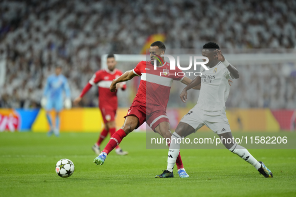 Josha Vagnoman right-back of Stuttgart and Germany and Vinicius Junior left winger of Real Madrid and Brazil compete for the ball during the...