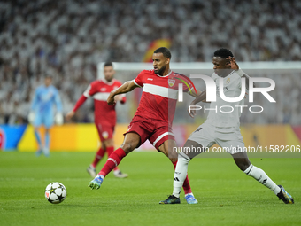 Josha Vagnoman right-back of Stuttgart and Germany and Vinicius Junior left winger of Real Madrid and Brazil compete for the ball during the...